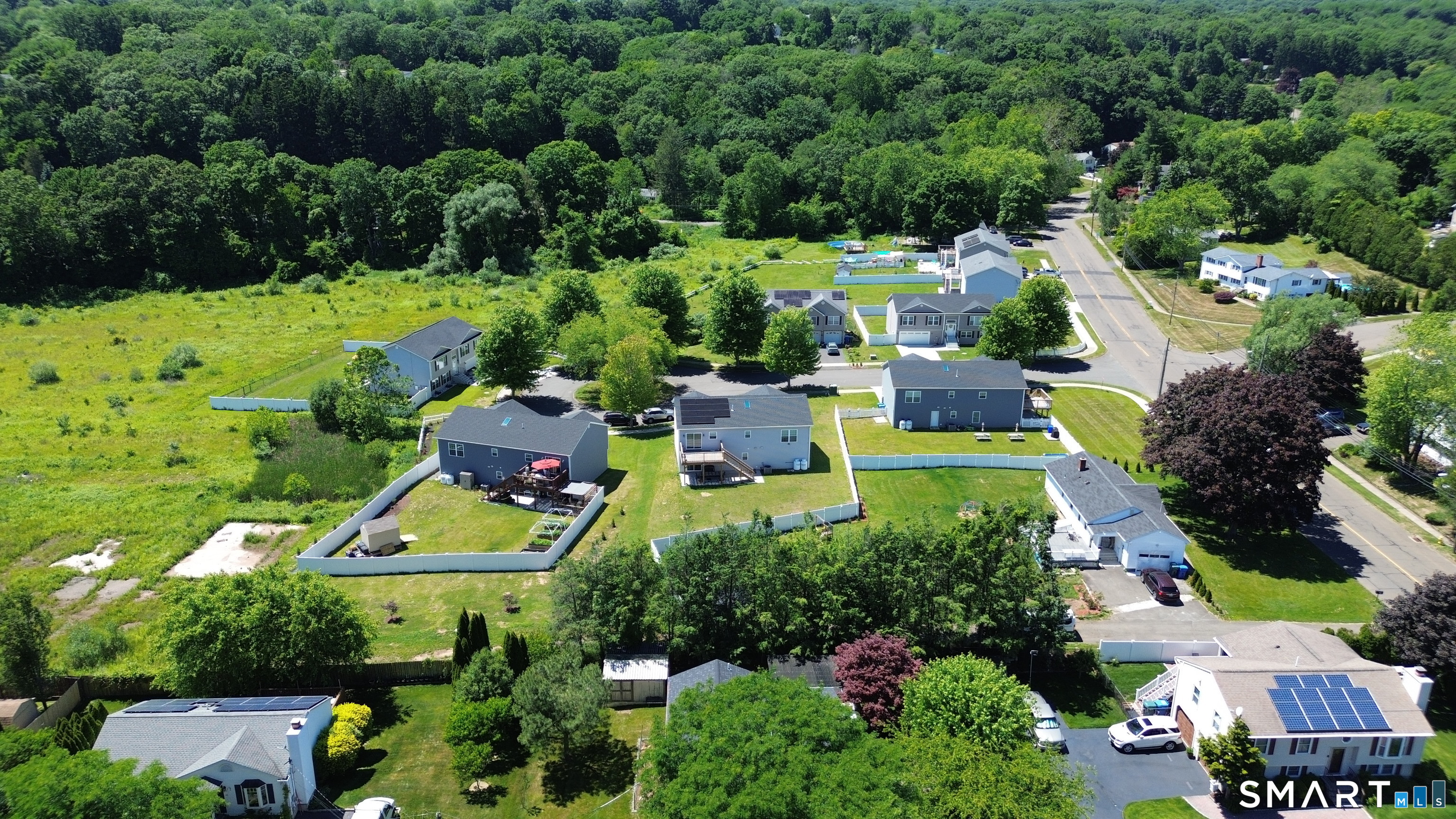 39 Joseph Lane Hamden, CT 06514 - Photo 40 of 40 an aerial view of a house with a yard