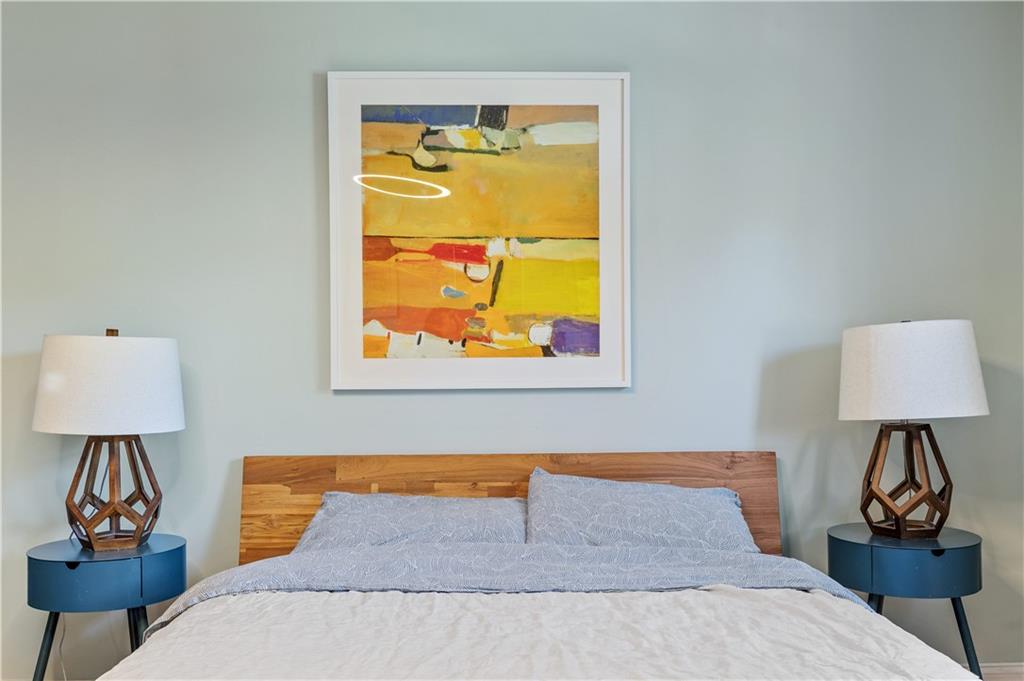 552 Audubon Avenue Pittsburgh, PA 15228 - Photo 16 of 30 a bedroom with a bed and a lamp on table