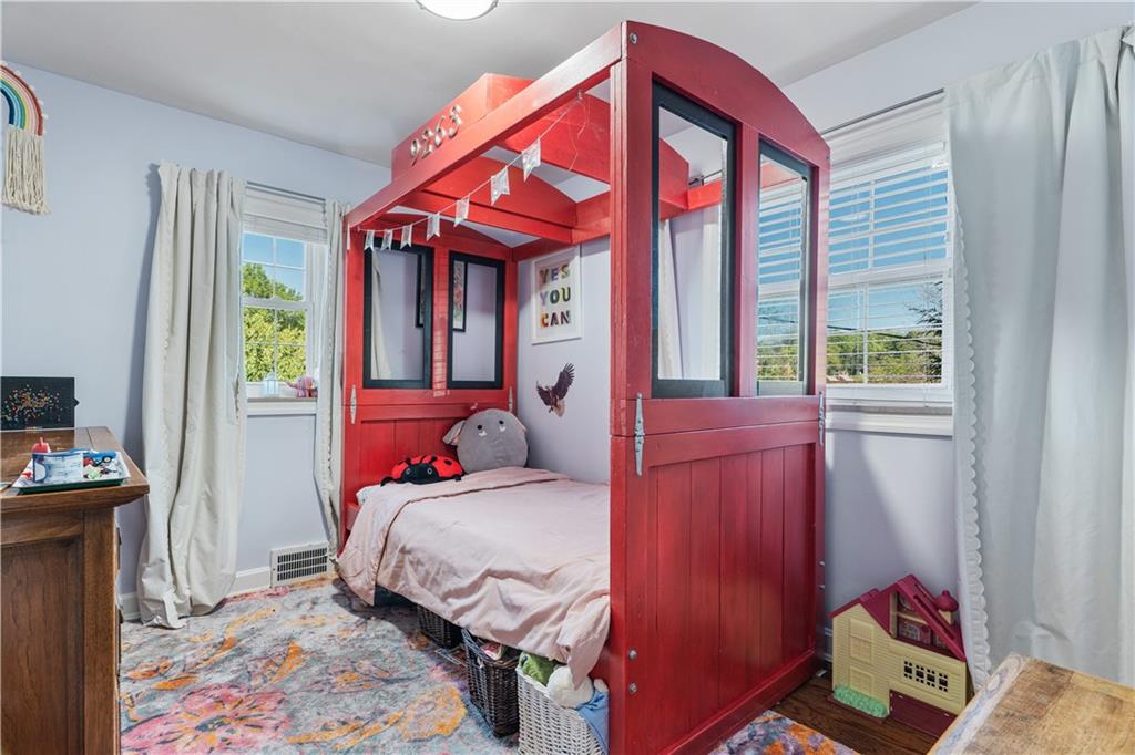 552 Audubon Avenue Pittsburgh, PA 15228 - Photo 18 of 30 a bedroom with a bed and a window