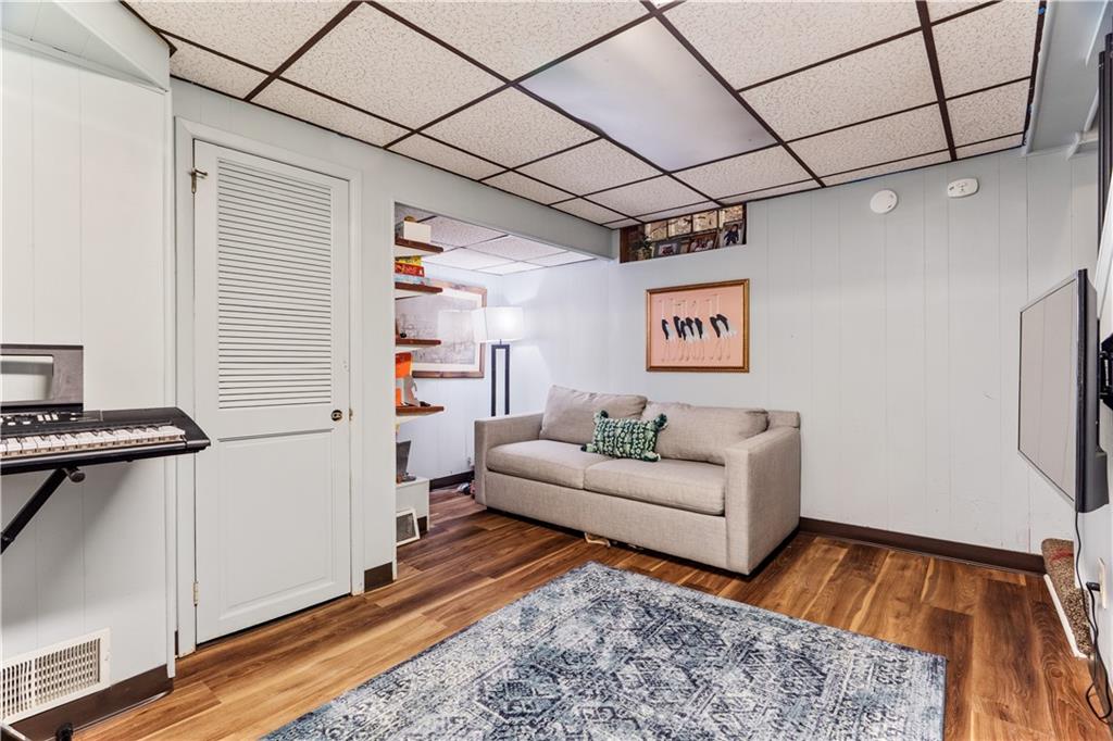 552 Audubon Avenue Pittsburgh, PA 15228 - Photo 20 of 30 a living room with furniture and a rug
