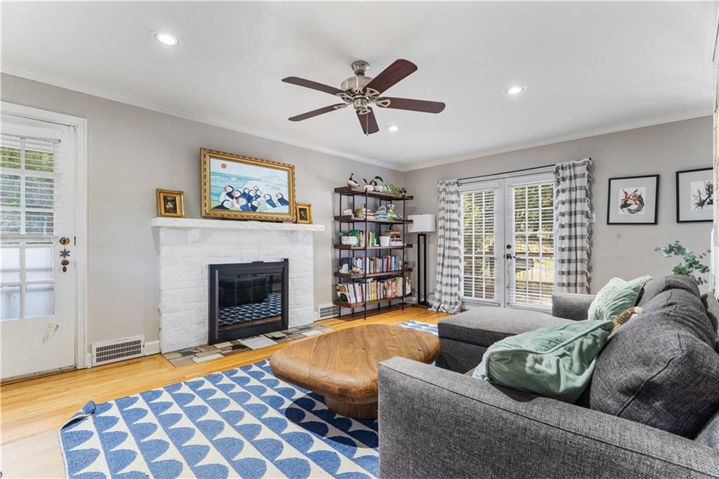 552 Audubon Avenue Pittsburgh, PA 15228 - Photo 4 of 30 a living room with furniture and a fireplace