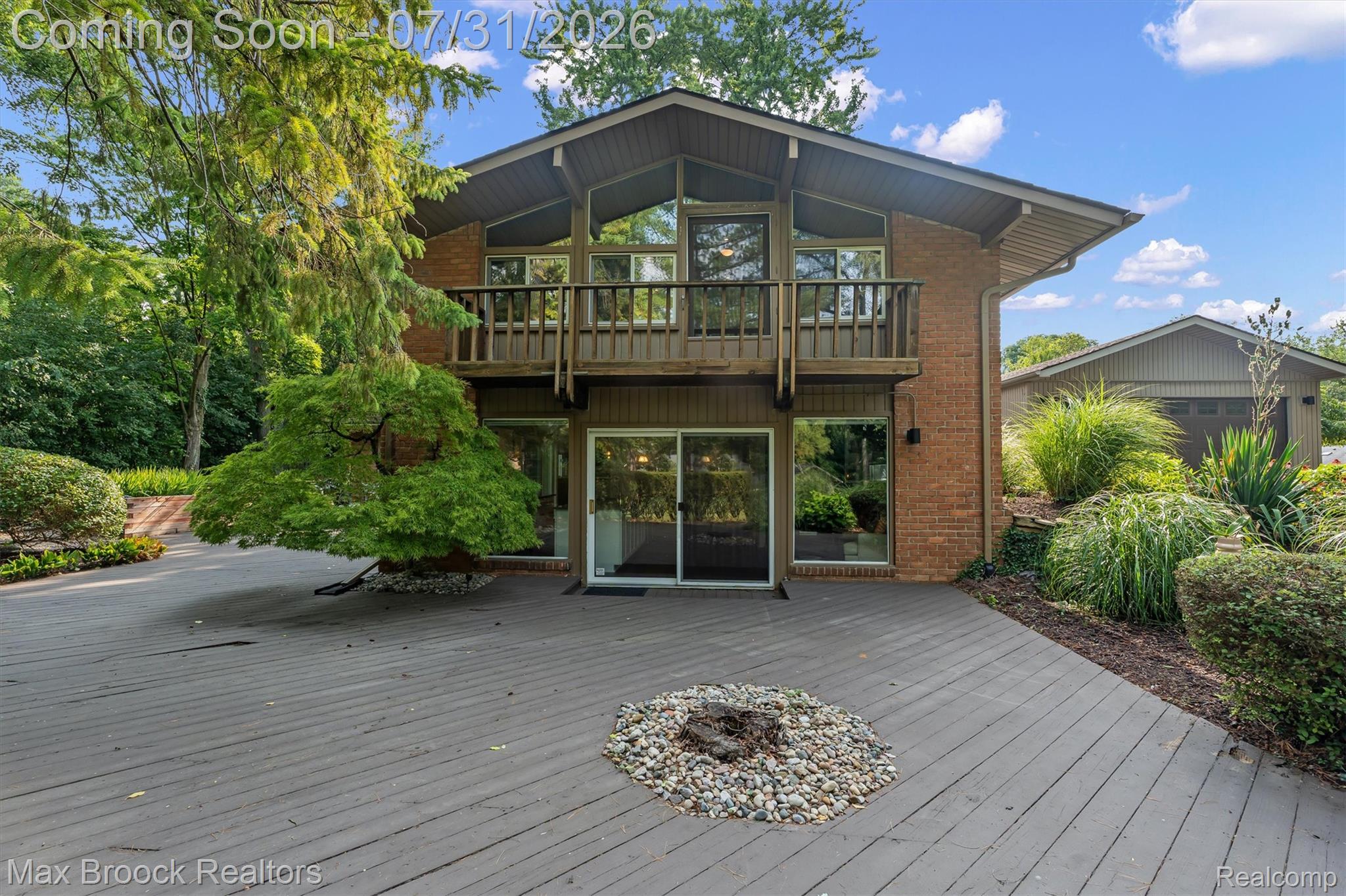 Side view of home featuring modular, post-and-beam mcm design