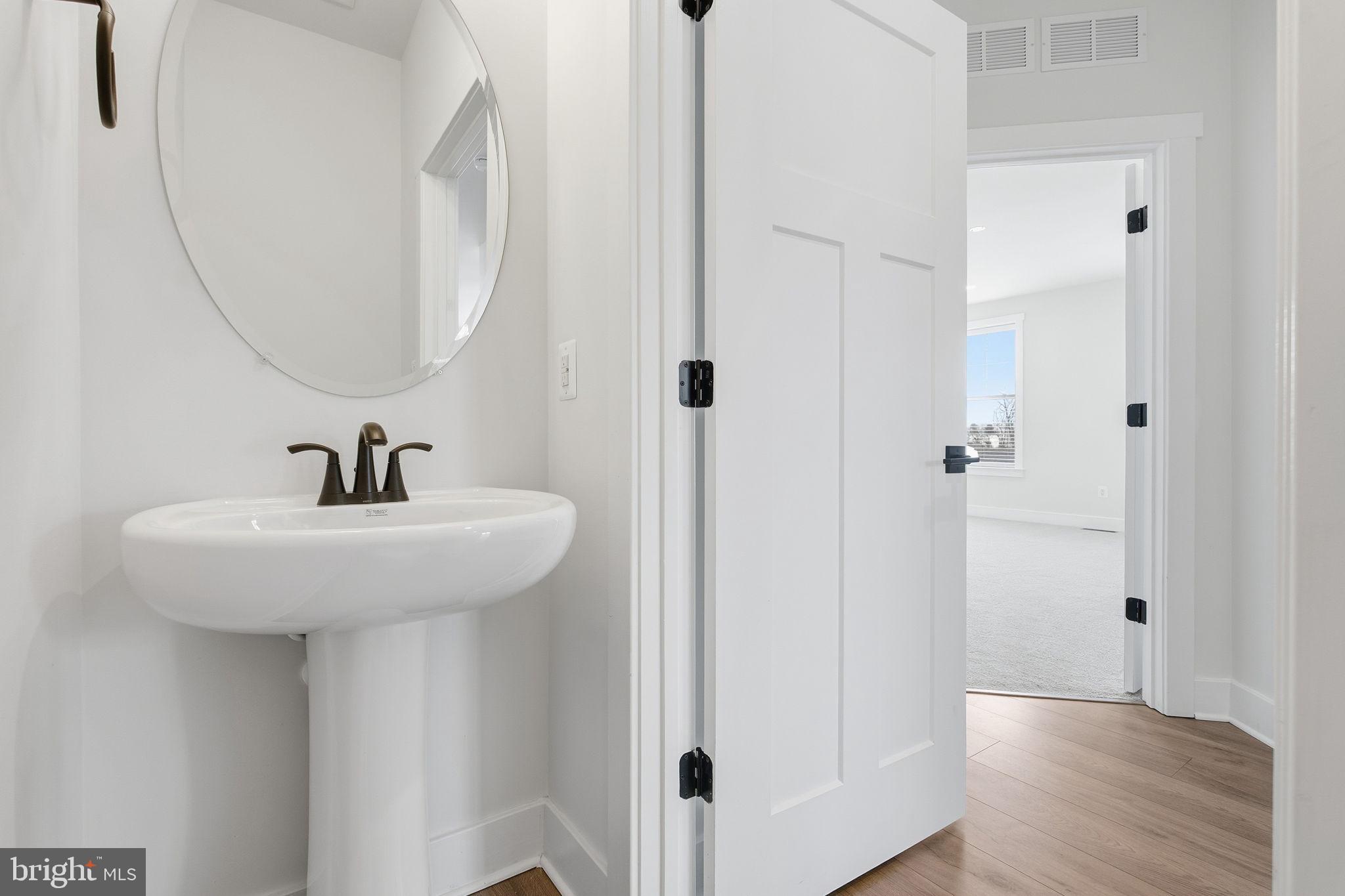 126 Bridge Valley Road Gettysburg, PA 17325 - Photo 12 of 36 a bathroom with a sink and a mirror