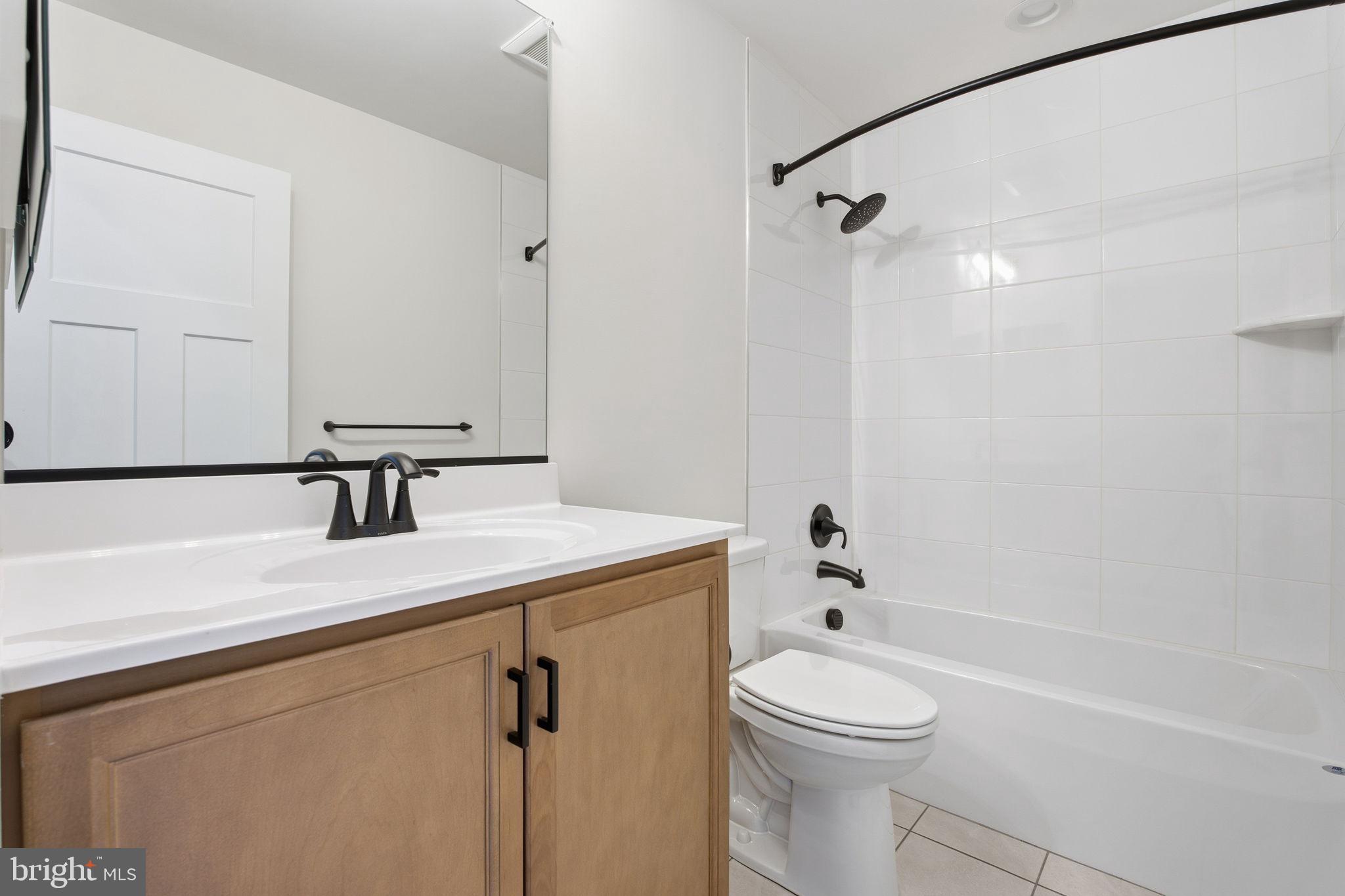 126 Bridge Valley Road Gettysburg, PA 17325 - Photo 31 of 36 a bathroom with a sink a toilet and shower