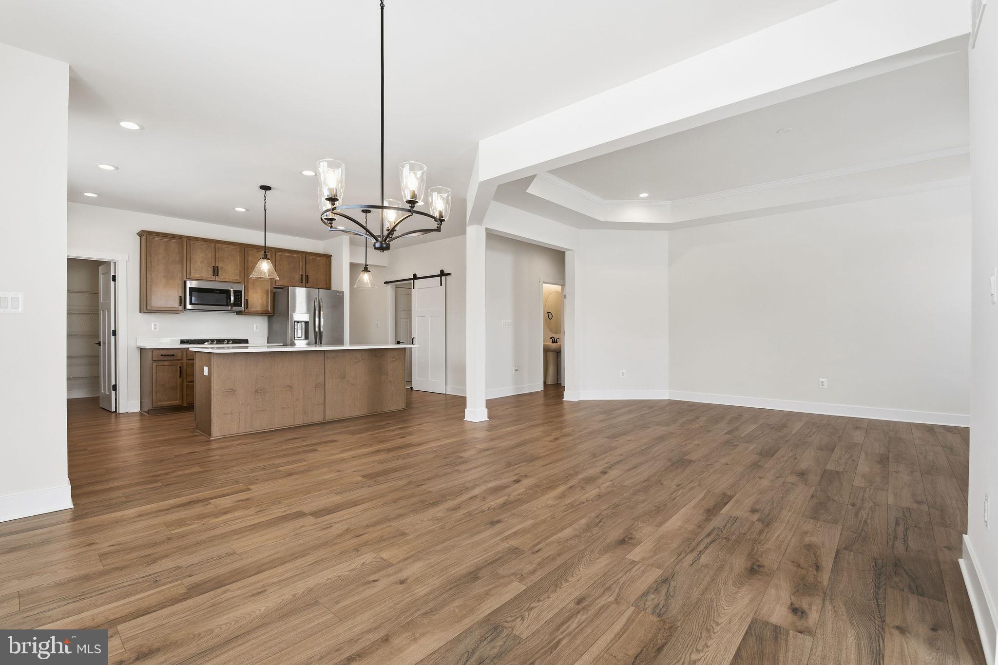 126 Bridge Valley Road Gettysburg, PA 17325 - Photo 5 of 36 a view of a kitchen with a sink and a refrigerator