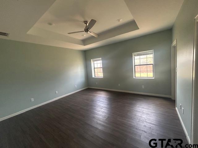 11510 Kitty Hawk Frankston, TX 75763 - Photo 11 of 26 an empty room with wooden floor fan and windows