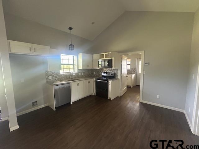 11510 Kitty Hawk Frankston, TX 75763 - Photo 13 of 26 a kitchen with a refrigerator and a stove top oven