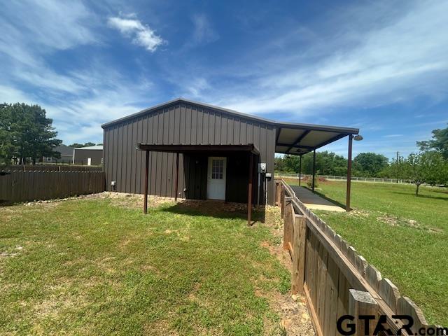 11510 Kitty Hawk Frankston, TX 75763 - Photo 25 of 26 a view of a house with backyard and porch