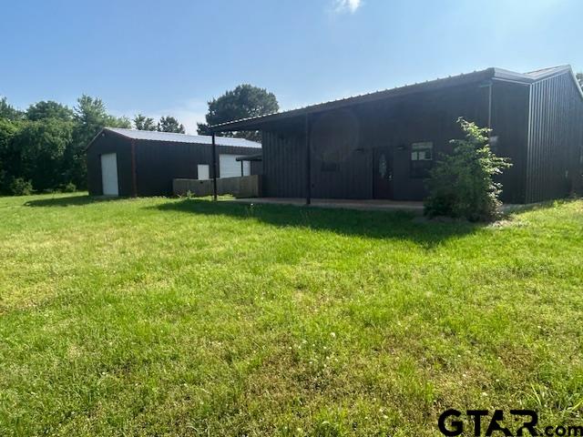 11510 Kitty Hawk Frankston, TX 75763 - Photo 4 of 26 a backyard of a house with lots of green space