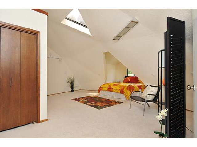 3895 Page Mill Road Los Altos, CA 94022 - Photo 11 of 15 a bedroom with a bed and wooden floor