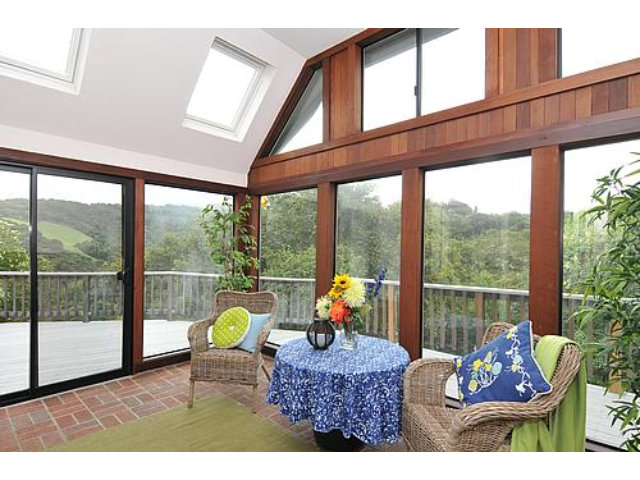 3895 Page Mill Road Los Altos, CA 94022 - Photo 10 of 15 a living room filled with furniture and a large window