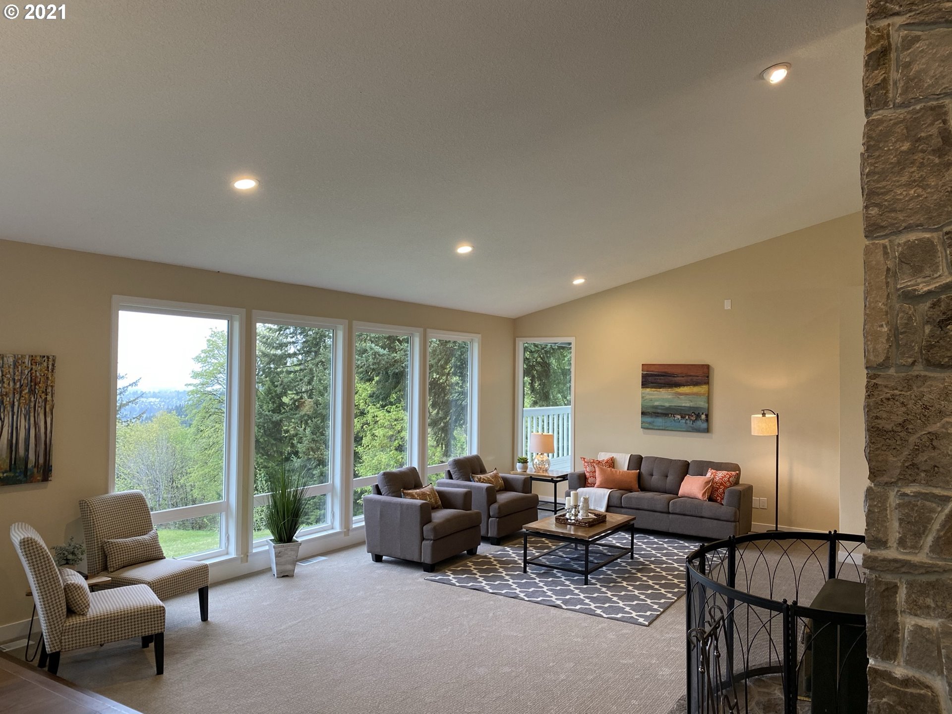 8900 Southeast Alder Ridge Road Damascus, OR 97089 - Photo 3 of 32 a living room with furniture and a large window