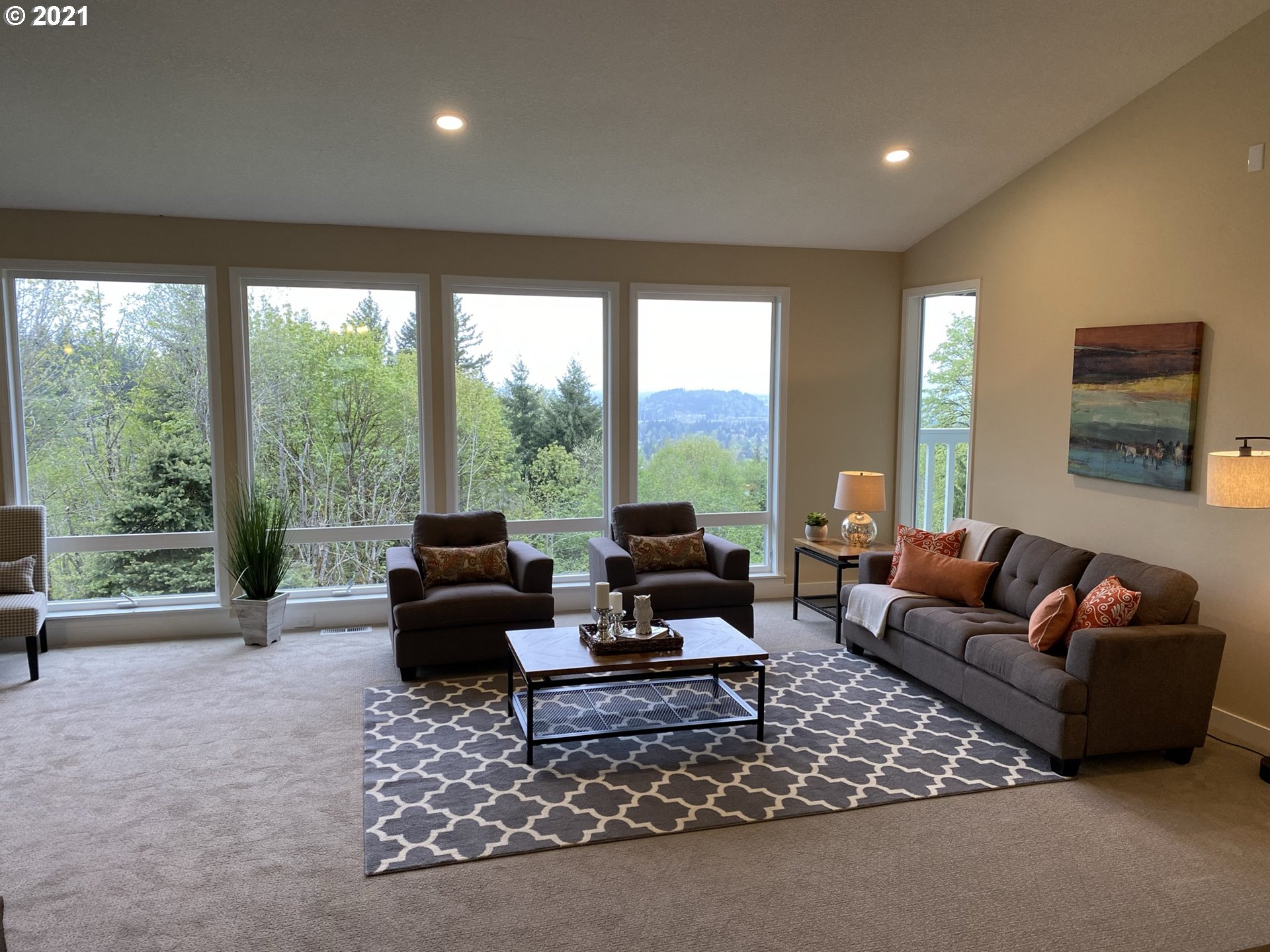 8900 Southeast Alder Ridge Road Damascus, OR 97089 - Photo 4 of 32 a living room with furniture and a large window