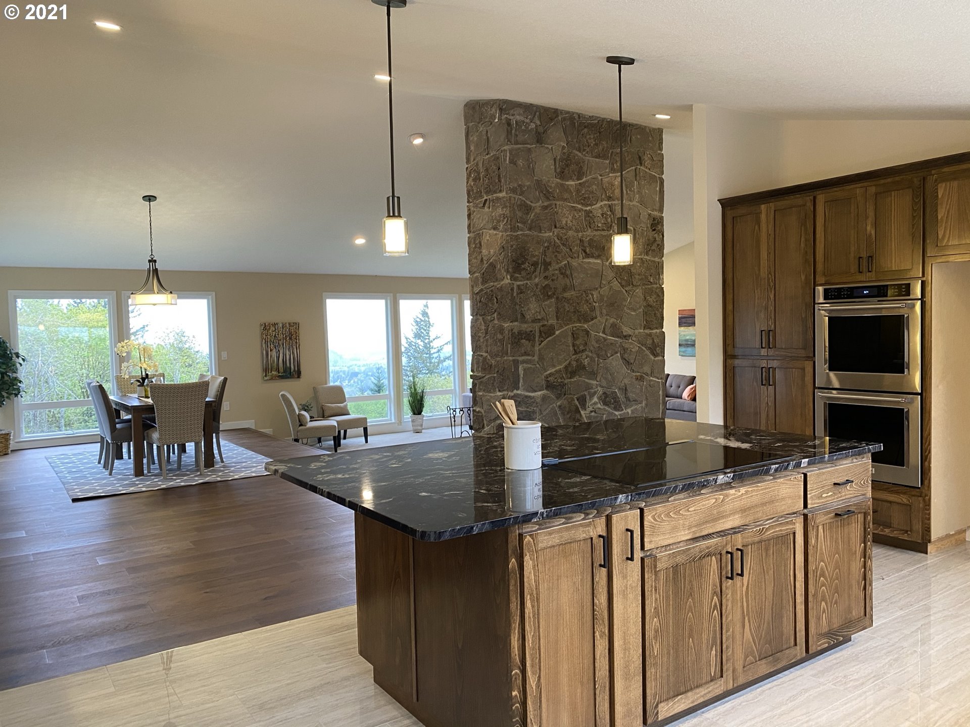 8900 Southeast Alder Ridge Road Damascus, OR 97089 - Photo 6 of 32 a kitchen with counter top space appliances and cabinets