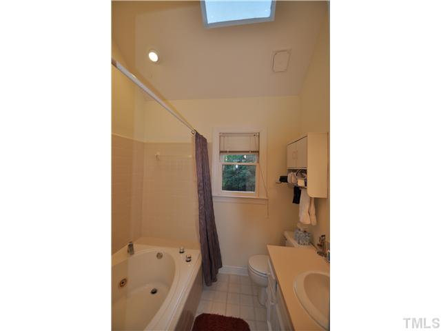3833 Old Coach Road Raleigh, NC 27616 - Photo 14 of 24 Vaulted ceiling, sky light and fresh paint in 2010.