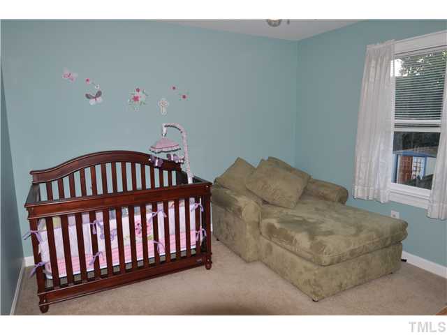 3833 Old Coach Road Raleigh, NC 27616 - Photo 17 of 24 Guest bedroom or nursery off the back of the second floor with a view to the private back yard.