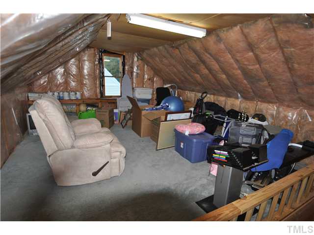 3833 Old Coach Road Raleigh, NC 27616 - Photo 18 of 24 Additional 500 square feet in walk-up attic. Could be finished as a bonus, bedroom or office space. Lots of extra storage space.
