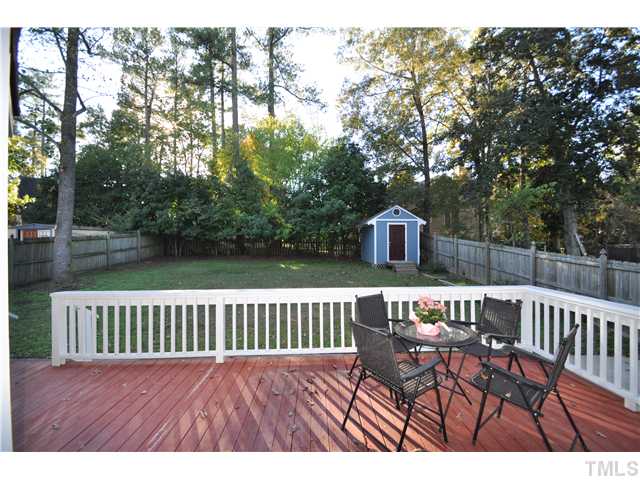 3833 Old Coach Road Raleigh, NC 27616 - Photo 20 of 24 Huge back deck off the living room and laundry room.