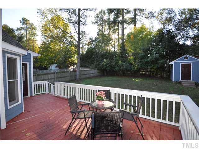 3833 Old Coach Road Raleigh, NC 27616 - Photo 21 of 24 Deck stained and painted in 2009. Storage shed is wired and great additonal space.