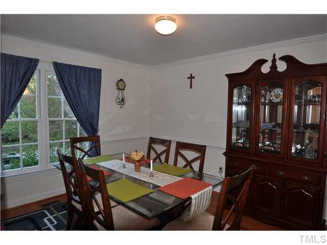 3833 Old Coach Road Raleigh, NC 27616 - Photo 6 of 24 Separate formal dining room off the kitchen with beautiful hardwood flooring installed 2008.