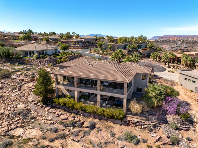 2376 Stone Crest Circle St. George, UT 84790 - Photo 53 of 61 Aerial perspective of suburban area featuring a mountainous background