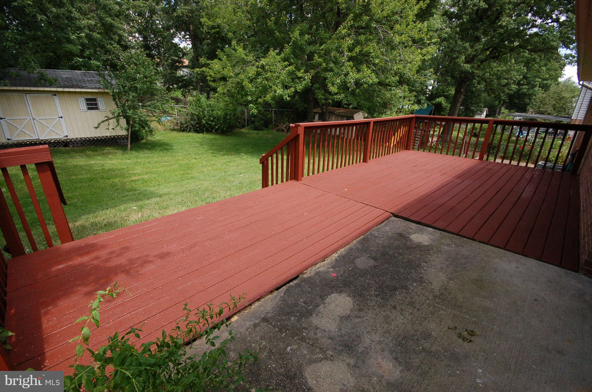 3132 Castleleigh Road Silver Spring, MD 20904 - Photo 23 of 25 a view of a backyard with wooden fence