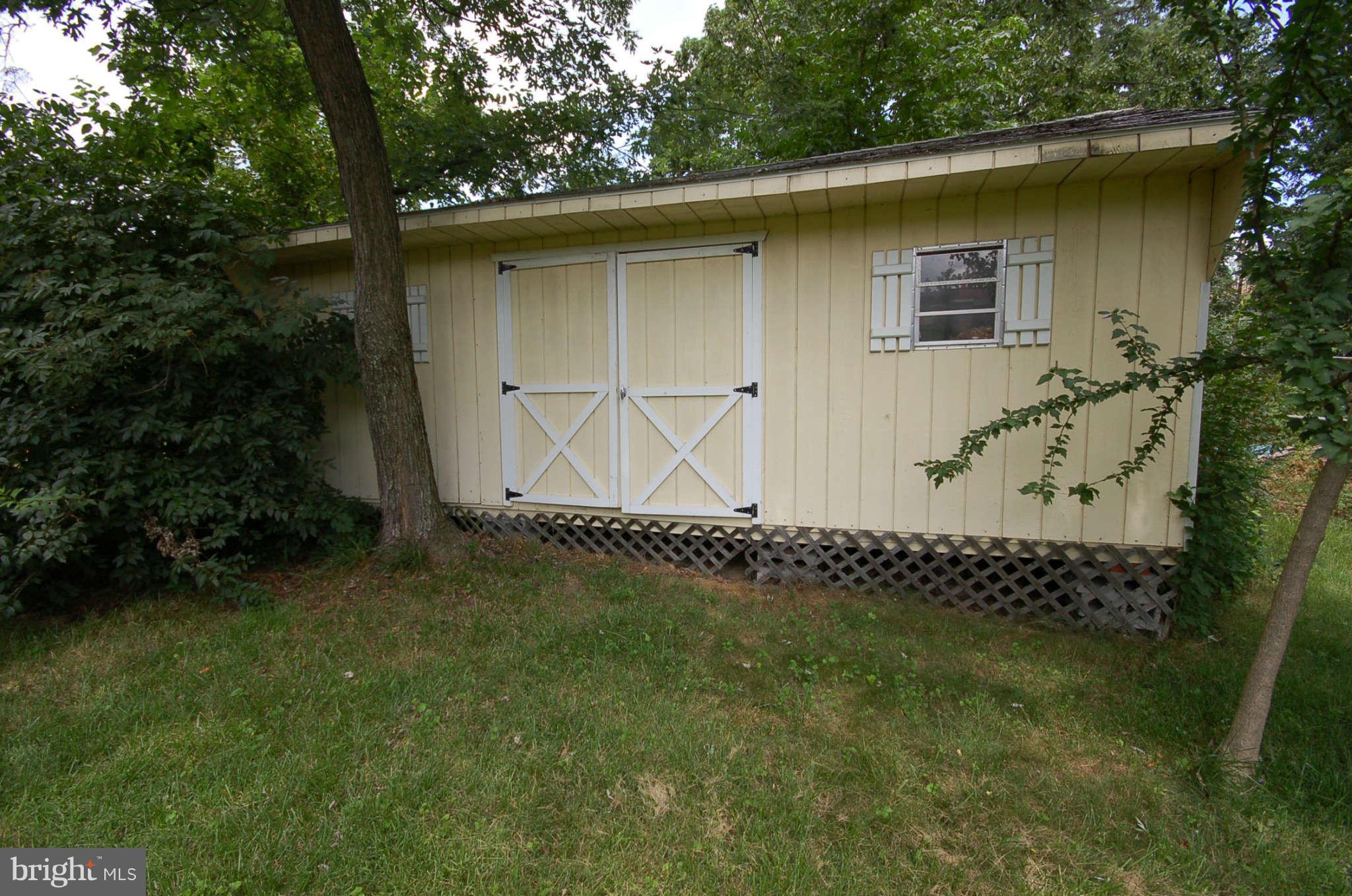 3132 Castleleigh Road Silver Spring, MD 20904 - Photo 25 of 25 a front view of a house with garden