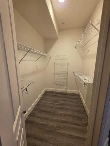 a view of an empty walk in closet