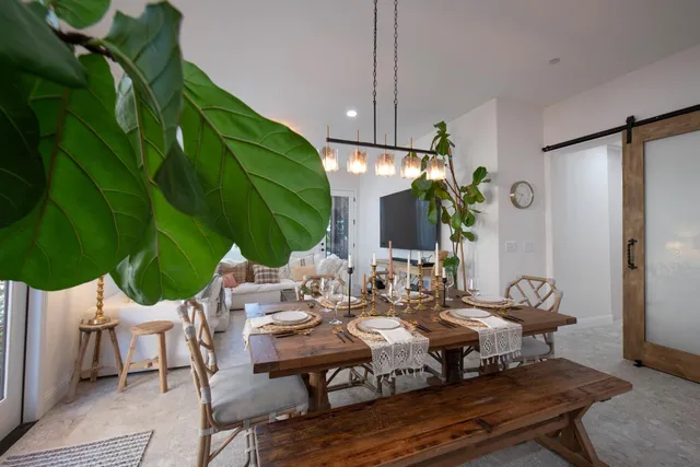 a view of an outdoor dining space with furniture