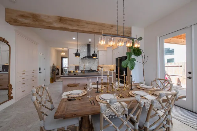 a view of a dining room with furniture window and outside view
