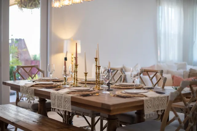 a living room with furniture and a lamp