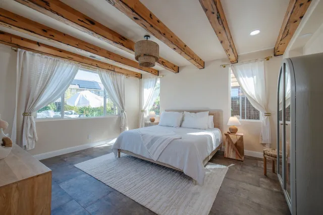 a bathroom with a double vanity sink mirror and toilet