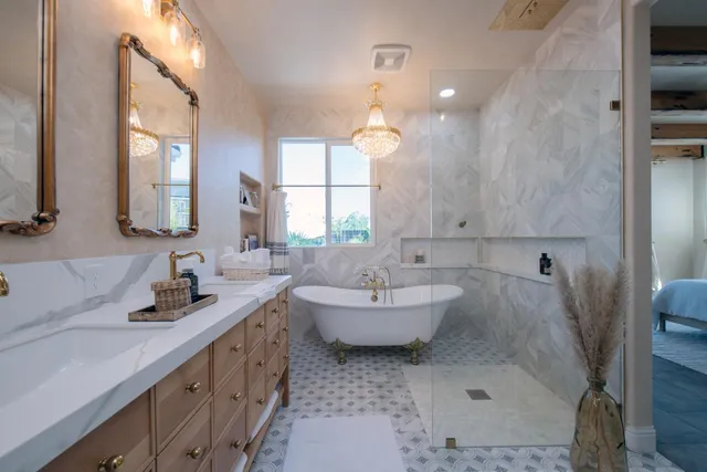 a large bathroom with a double vanity sink and a mirror