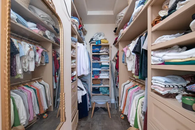 a swimming pool with outdoor seating and yard