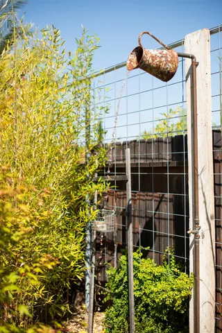 a view of a yard with table and chairs