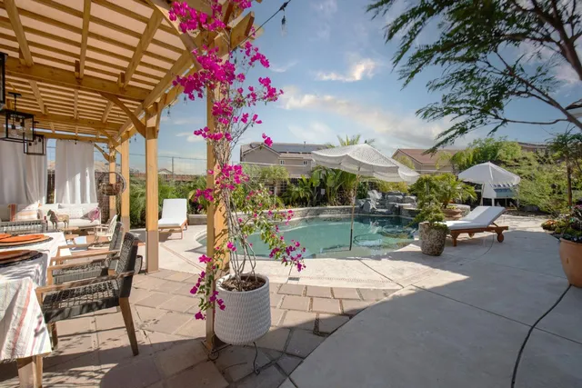 a potted plant sitting in front of a house