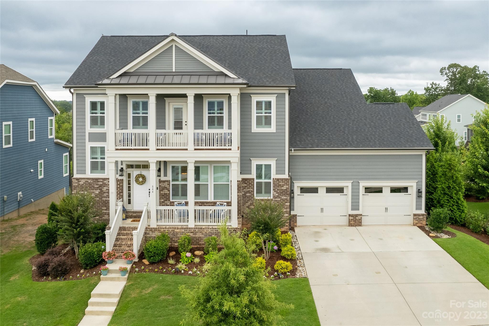 844 Bee Balm Trail Fort Mill, SC 29708 - Photo 1 of 48 a front view of a house with a yard