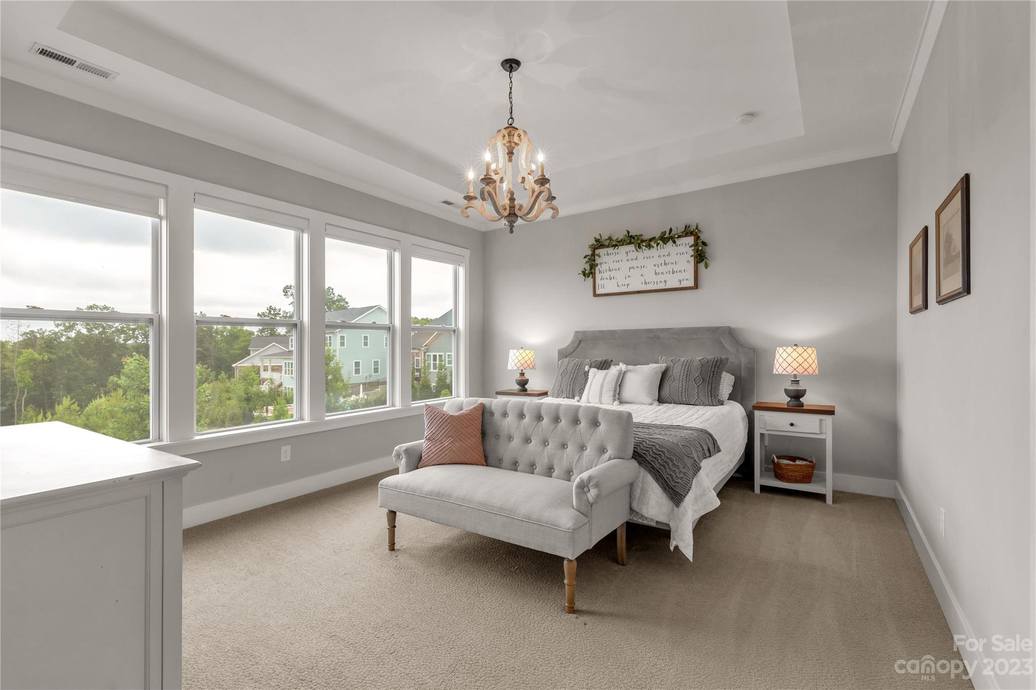 844 Bee Balm Trail Fort Mill, SC 29708 - Photo 17 of 48 a spacious bedroom with a bed and a large window