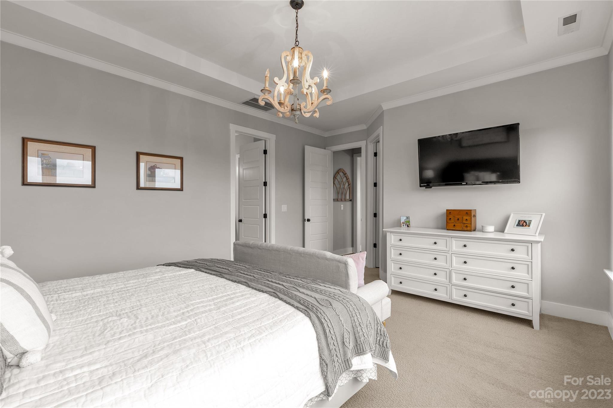 844 Bee Balm Trail Fort Mill, SC 29708 - Photo 19 of 48 a bedroom with a bed and a flat screen tv