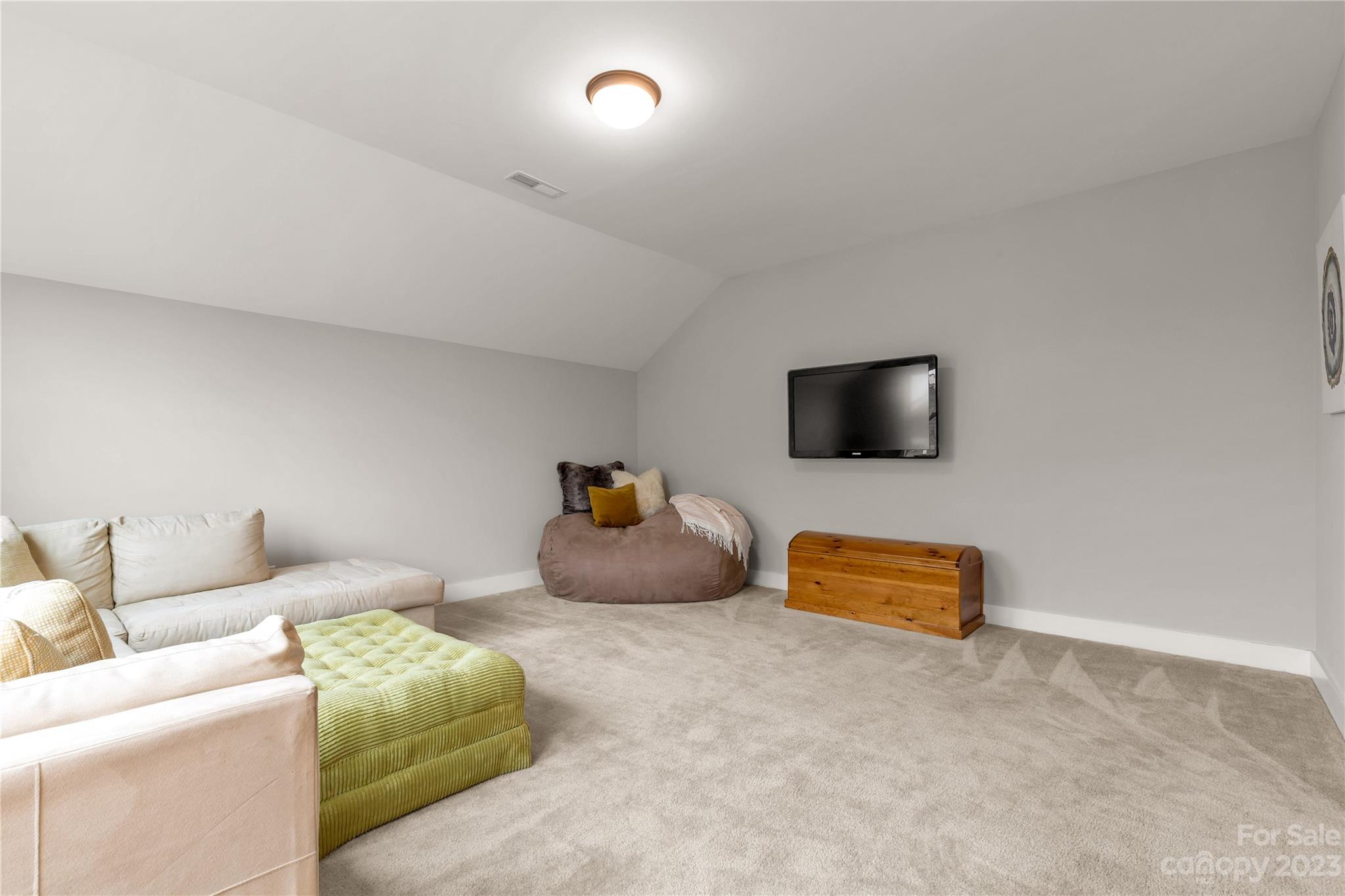 844 Bee Balm Trail Fort Mill, SC 29708 - Photo 25 of 48 a living room with furniture and a flat screen tv