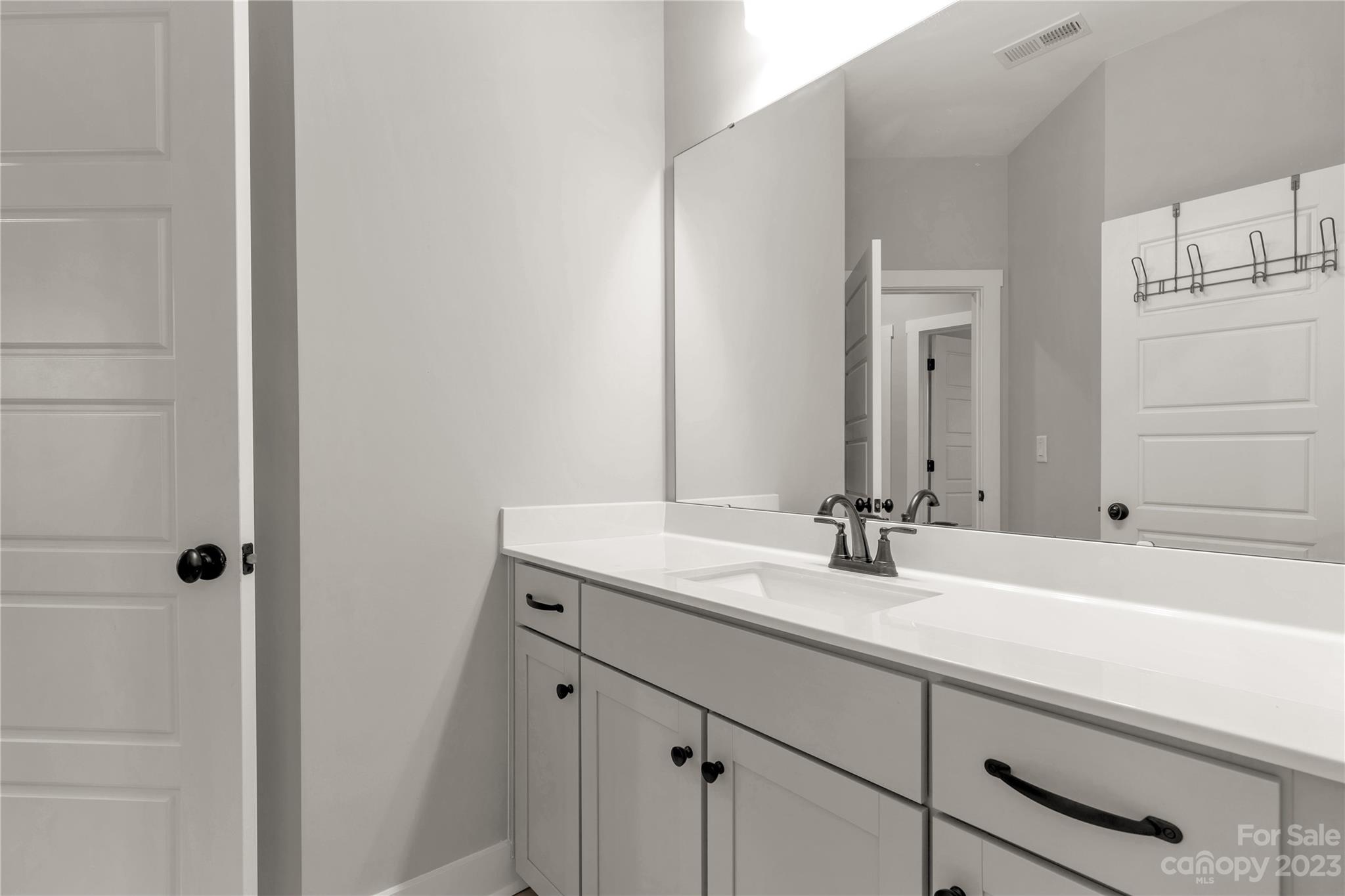844 Bee Balm Trail Fort Mill, SC 29708 - Photo 29 of 48 a bathroom with a sink and a mirror