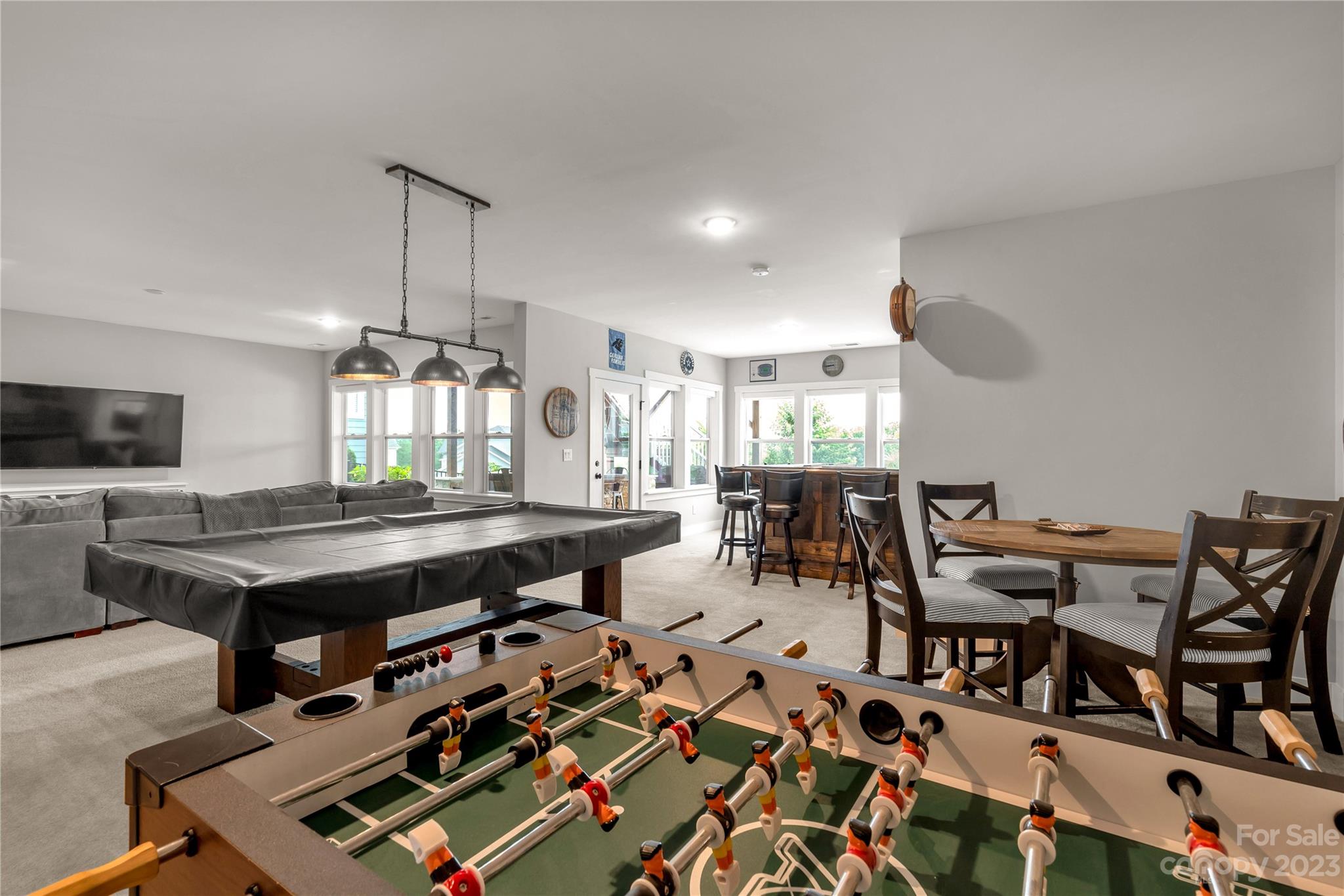 844 Bee Balm Trail Fort Mill, SC 29708 - Photo 41 of 48 a living room with lots of furniture and a wooden floor