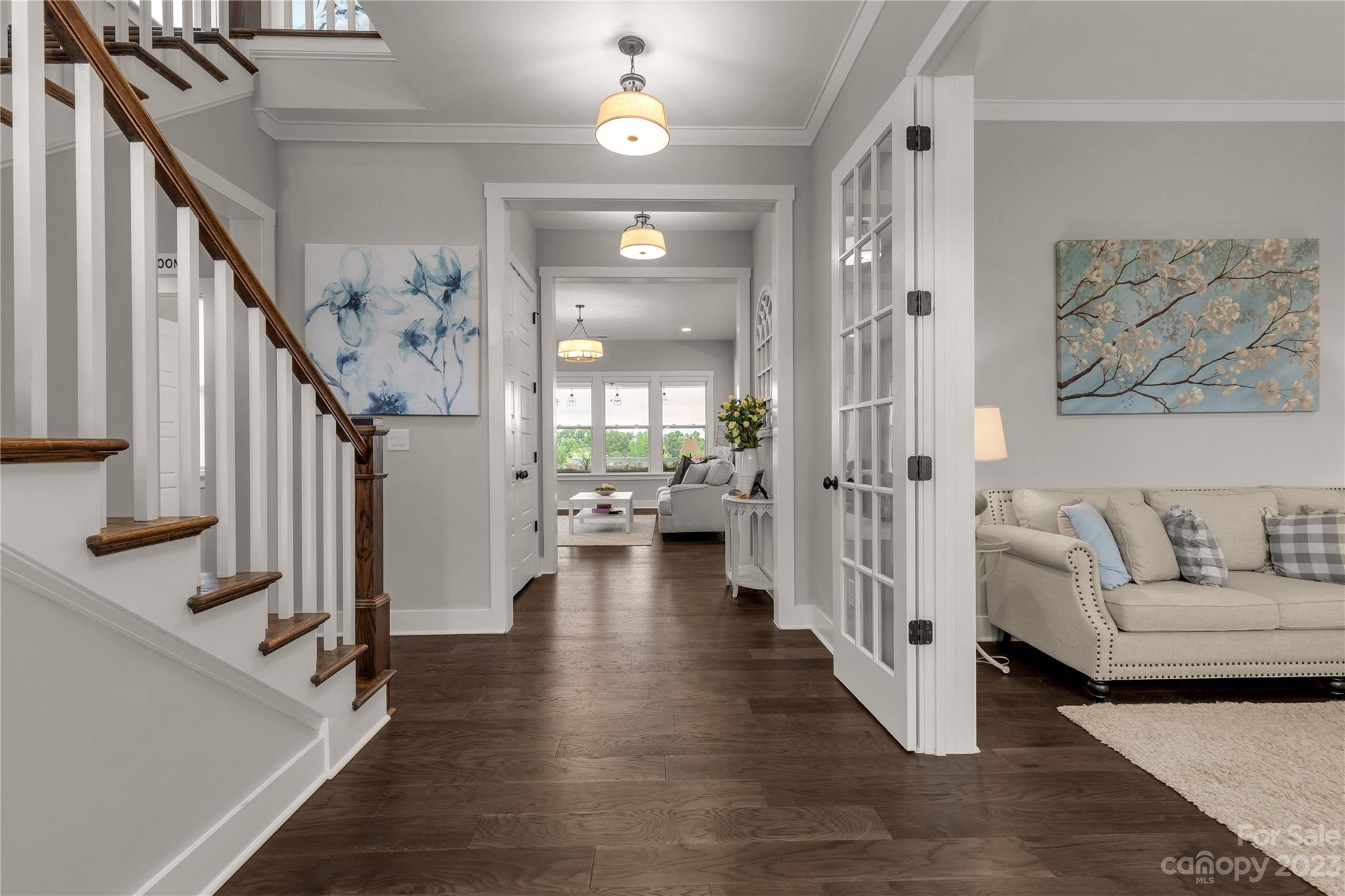 844 Bee Balm Trail Fort Mill, SC 29708 - Photo 6 of 48 a living room with furniture and a wooden floor
