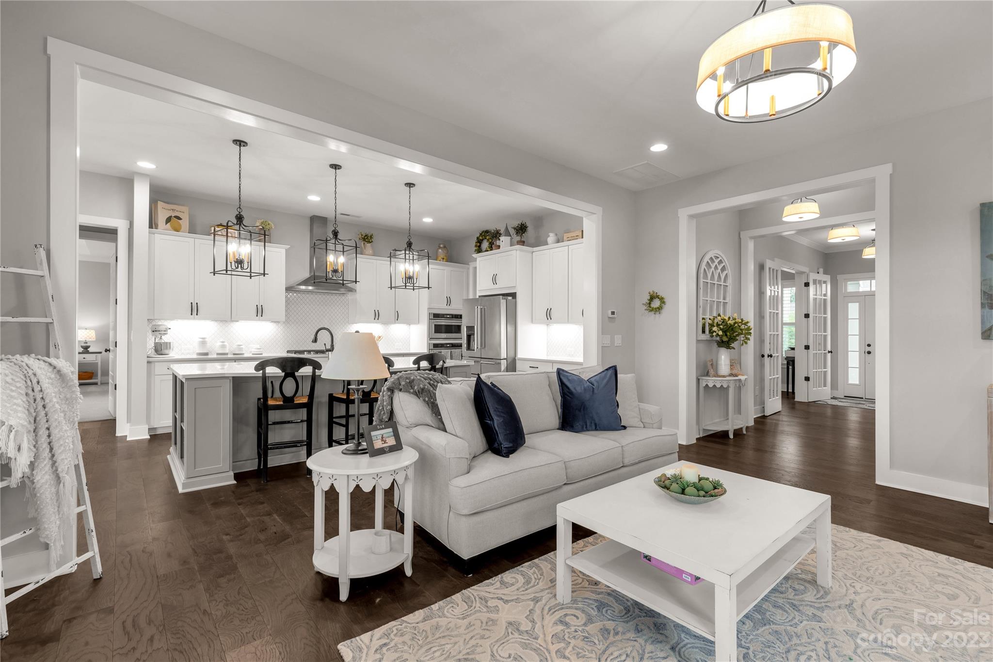 844 Bee Balm Trail Fort Mill, SC 29708 - Photo 9 of 48 a living room with furniture and a wooden floor