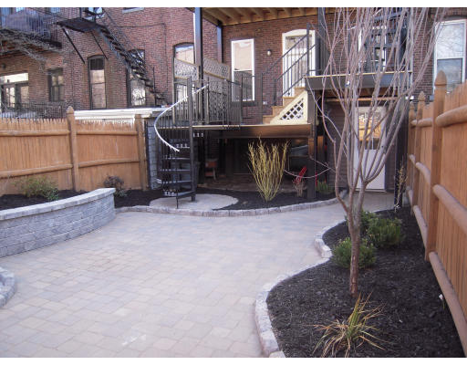297 K Street, Unit 1 Boston, MA 02127 - Photo 25 of 25 a view of a patio with table and chairs