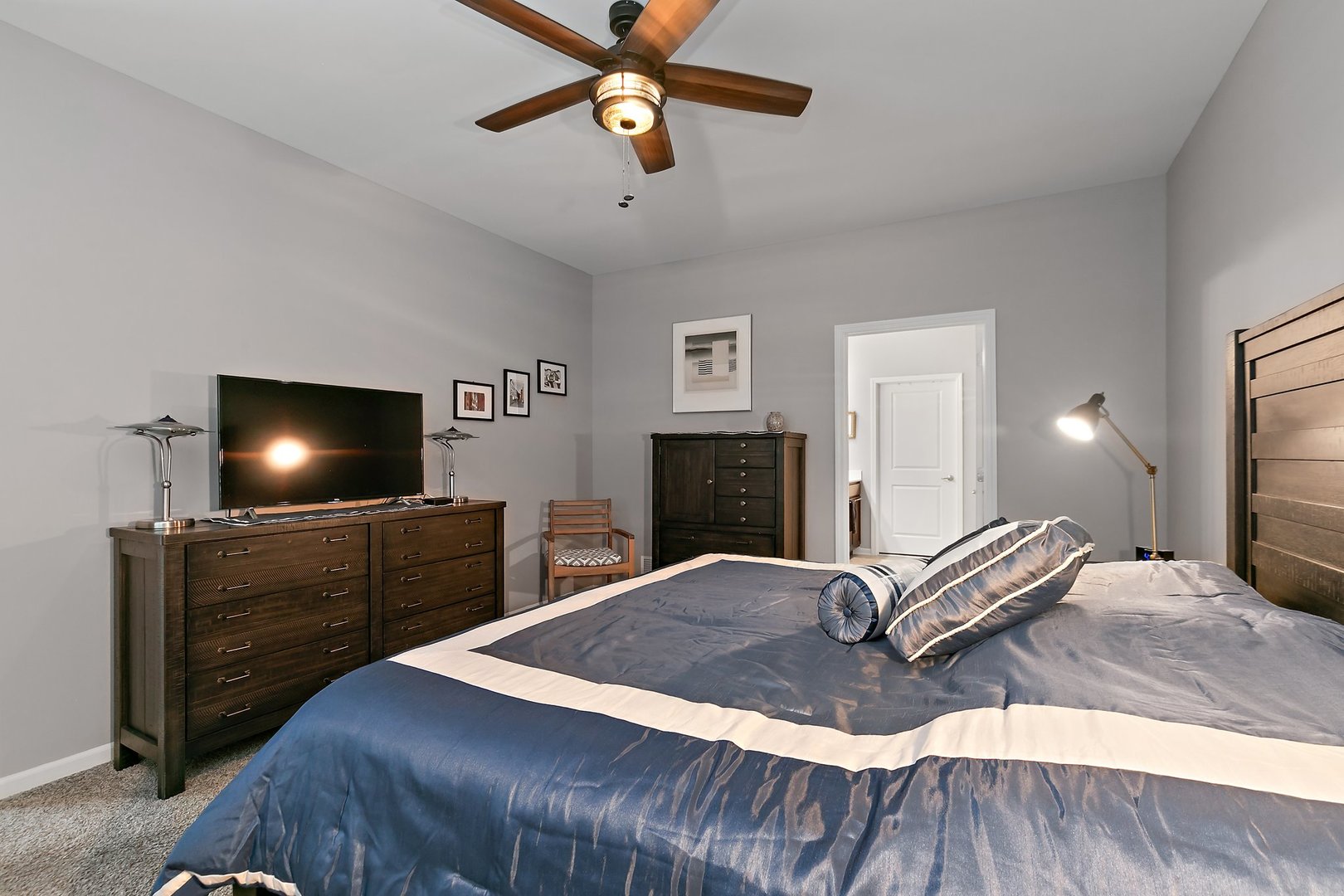 1979 Southern Circle, Unit 1979 Pingree Grove, IL 60140 - Photo 15 of 22 a bedroom with a bed and a flat screen tv