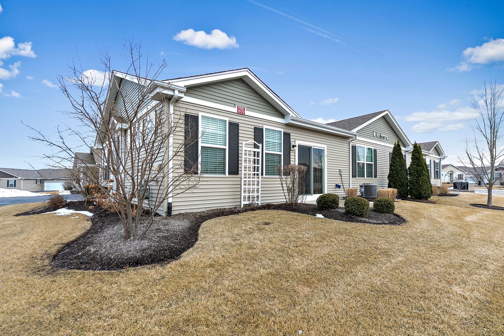 1979 Southern Circle, Unit 1979 Pingree Grove, IL 60140 - Photo 20 of 22 a view of a house with a patio