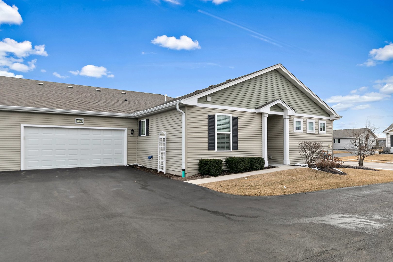 1979 Southern Circle, Unit 1979 Pingree Grove, IL 60140 - Photo 2 of 22 a view of a house with a patio