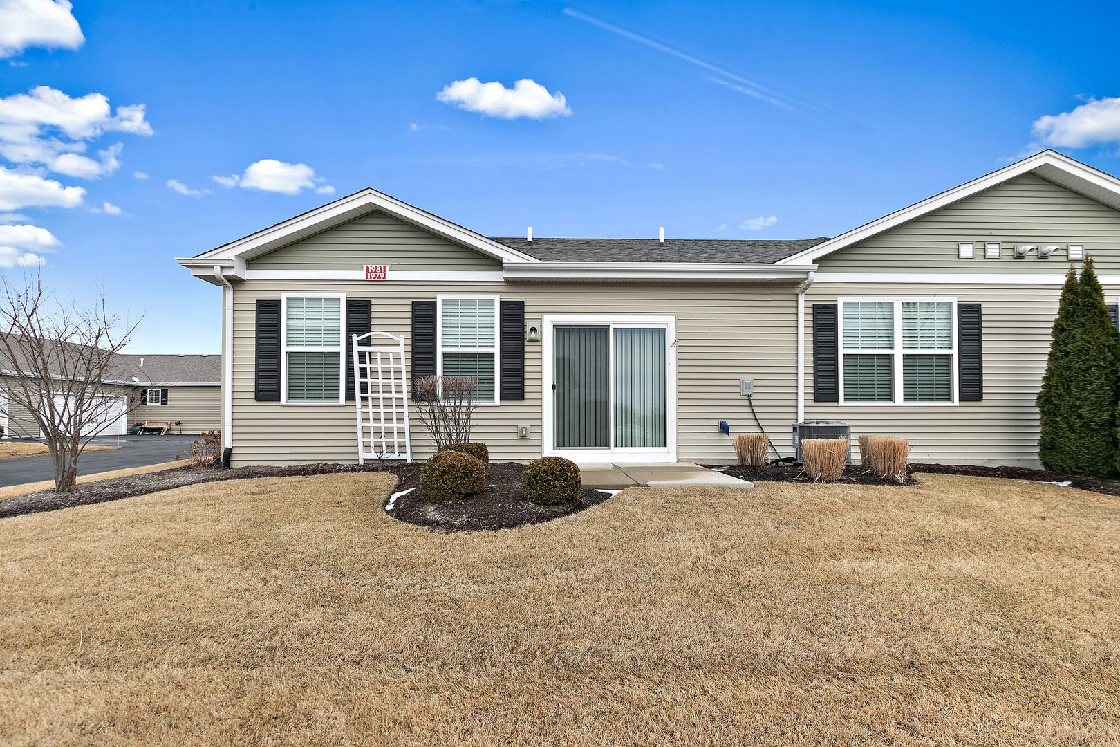 1979 Southern Circle, Unit 1979 Pingree Grove, IL 60140 - Photo 21 of 22 a front view of a house with a outdoor space