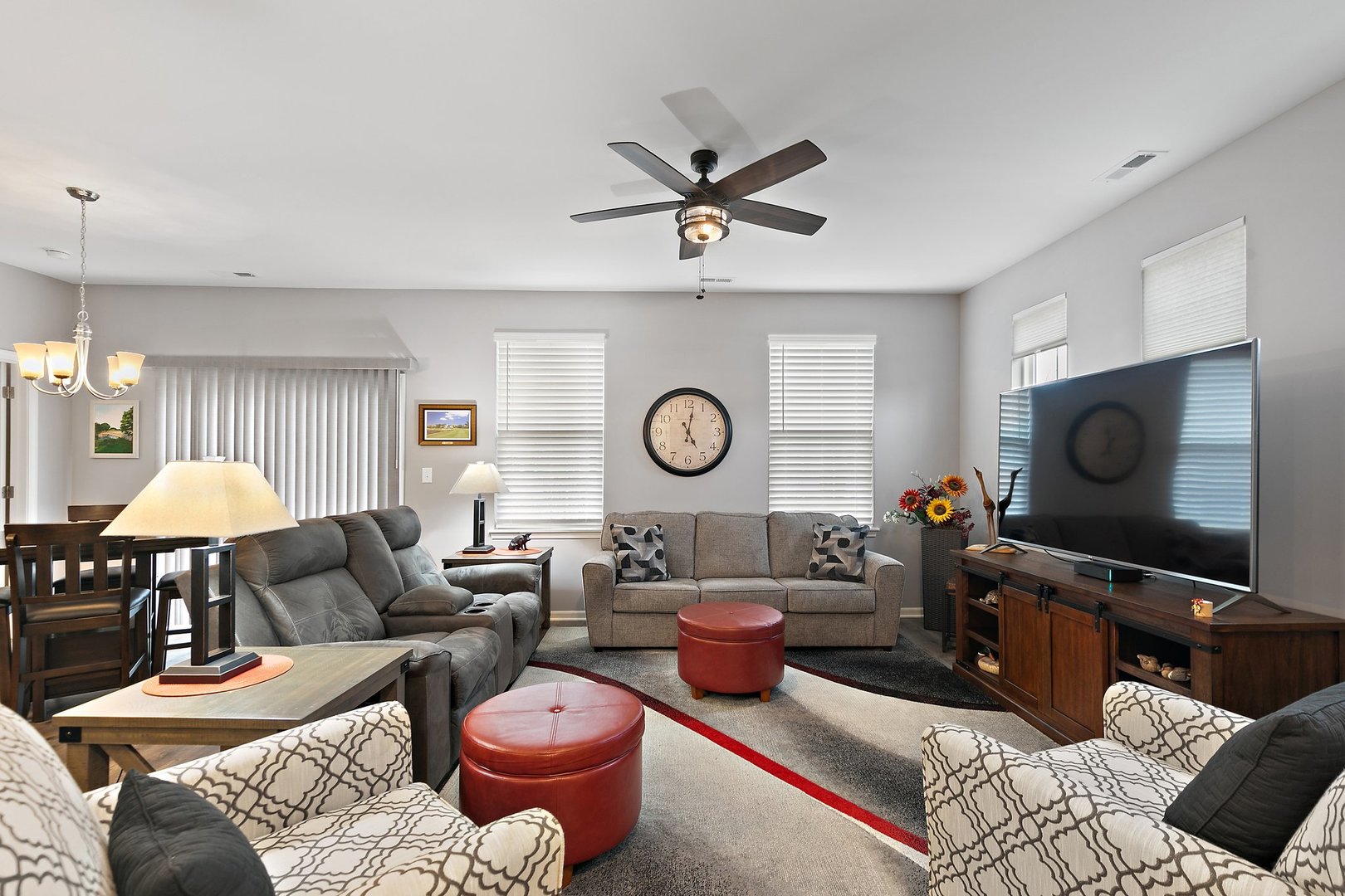 1979 Southern Circle, Unit 1979 Pingree Grove, IL 60140 - Photo 4 of 22 a living room with furniture a rug and a window